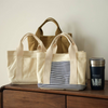 Gestreifte Lunch-Handtasche aus Baumwollcanvas
